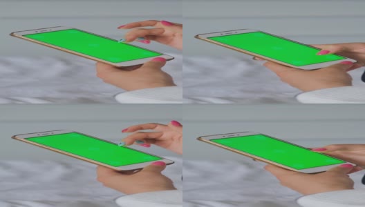 绿屏智能手机的女性之手高清在线视频素材下载