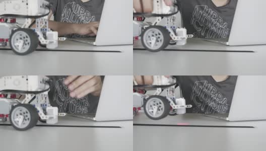 孩子玩自制的机器人STEM高清在线视频素材下载