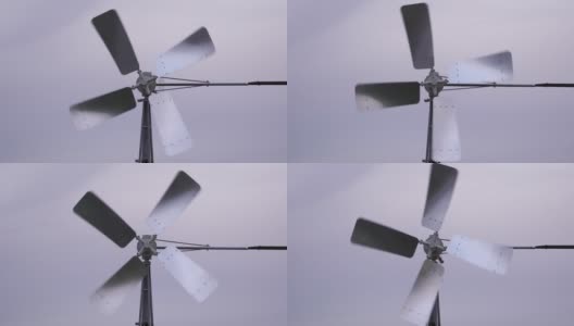 小型金属风车一种具有快速旋转叶片的小型金属风车高清在线视频素材下载
