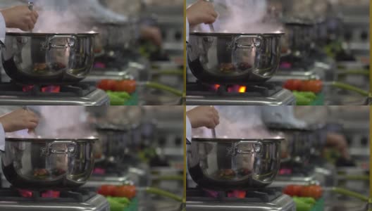 食物是在工业用的大厨房里煮的高清在线视频素材下载