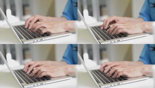 女人的手在键盘上打字的特写高清在线视频素材下载