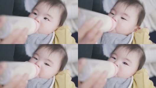 亚洲婴儿喝牛奶睡觉高清在线视频素材下载
