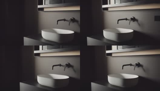 舒适的极简主义浴室，黑色和灰色色调，豪华现代家居高清在线视频素材下载
