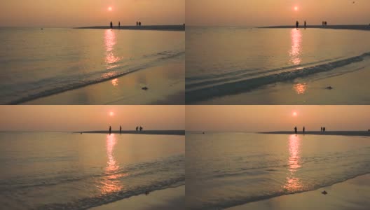 日落时分遥远的热带海滩的全景高清在线视频素材下载