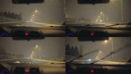 在一个下雪的夜晚开车。高清在线视频素材下载