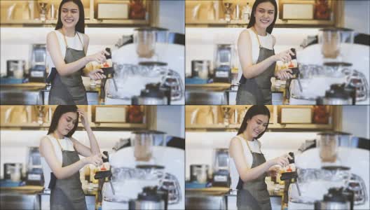 亚洲女性咖啡师微笑和使用咖啡机在咖啡店柜台-工作女性小企业主食品和饮料的咖啡馆概念高清在线视频素材下载