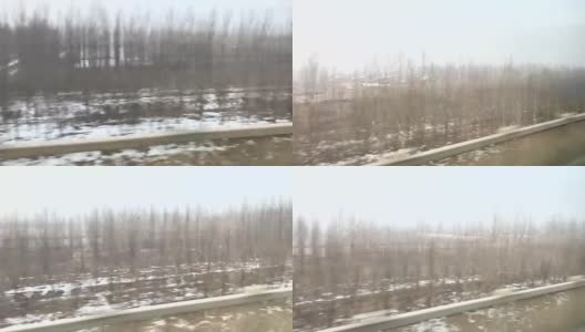 中国北京，子弹头列车上的城市景观。高清在线视频素材下载