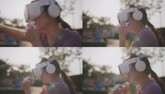 亚洲女性戴着虚拟现实耳机在户外打拳击锻炼高清在线视频素材下载