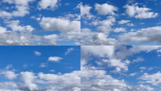一簇积云在蓝天上扩散和漂移的镜头。Cloudscape在日本高清在线视频素材下载