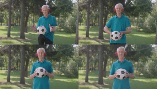 戴着耳机的快乐老人在夏日公园里与足球摆姿势。积极的白人男性退休人员看着相机微笑享受春天户外运动的肖像。长寿的概念。高清在线视频素材下载