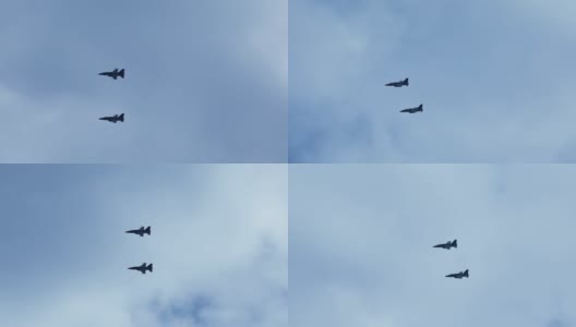 印度尼西亚首都雅加达，两架战斗机在晴朗的天空中飞行。4K分辨率专业拍摄高清在线视频素材下载