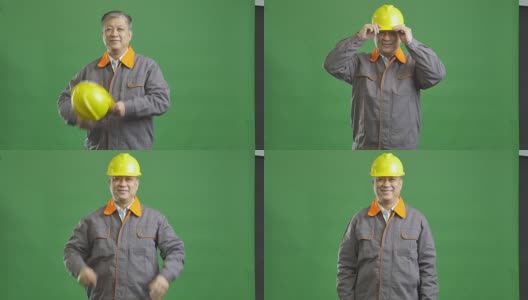 老亚洲人技术员工作制服和黄色安全帽4k高清在线视频素材下载