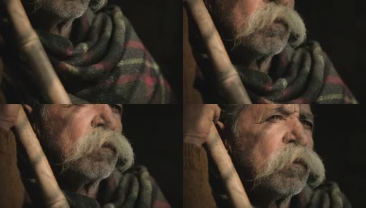 大胡子老人的画像，拿着竹竿。高清在线视频素材下载