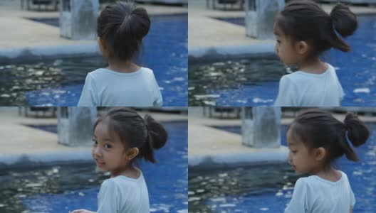 小女孩笑着游泳池高清在线视频素材下载