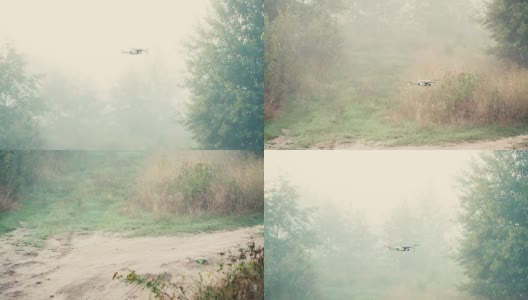 清晨，无人机在浓雾中降落在一条乡村公路上。高清在线视频素材下载
