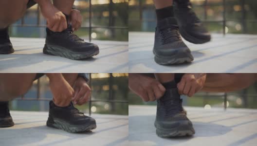 系鞋带的亚洲男人高清在线视频素材下载