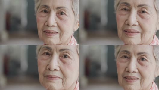 近4K影印空间，一位80多岁的亚洲老年女性(80多岁)正用快乐、活泼的表情和眼神对着镜头摆姿势，享受退休生活。高清在线视频素材下载