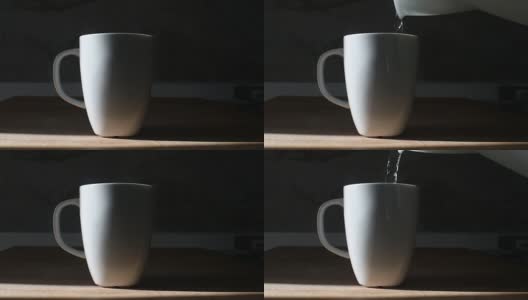 从水壶中倒入滚烫的开水到白咖啡或茶杯中高清在线视频素材下载