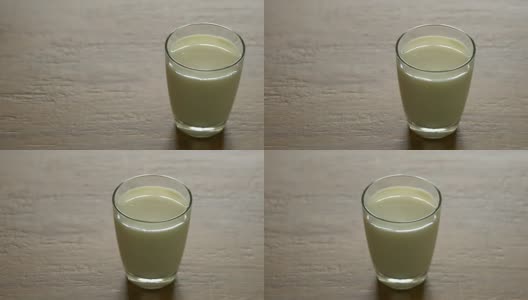 往玻璃杯里倒牛奶高清在线视频素材下载