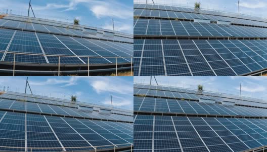 光电红外太阳能电池板接收来自太阳的光子。太阳能农场的绿色清洁能源。可再生能源。太阳能电池板以一定角度安装在地面上。高清在线视频素材下载