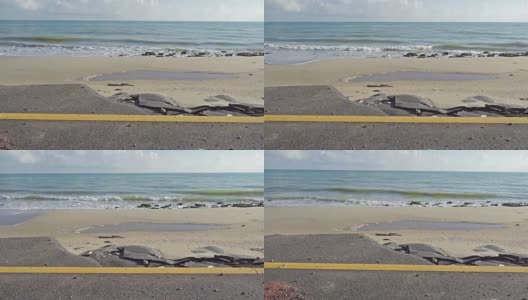 4K DOLLY:海岸公路被侵蚀损坏高清在线视频素材下载