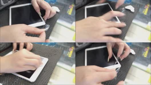 女性手部屏幕保护膜的数字平板电脑高清在线视频素材下载