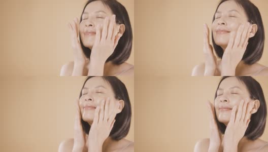 美丽的亚洲女性皮肤护理产品常规高清在线视频素材下载