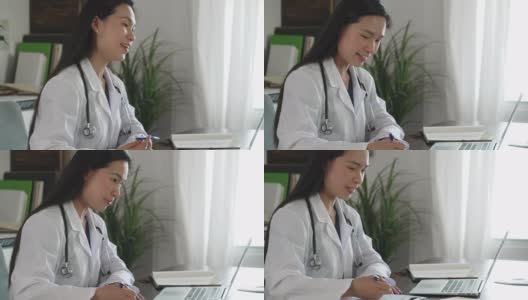 亚洲医疗专家在远程预约高清在线视频素材下载