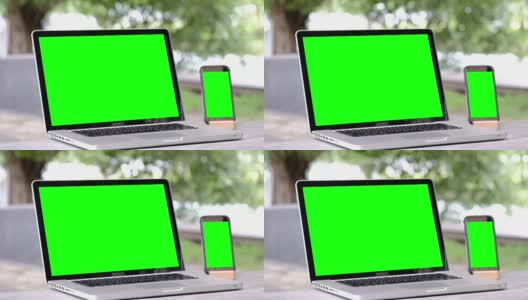 绿色屏幕的笔记本电脑和智能手机高清在线视频素材下载