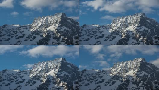 西拉克山峰(Ecrins国家公园)与过往的云。Valgaudemar Hautes-Alpes,法国高清在线视频素材下载