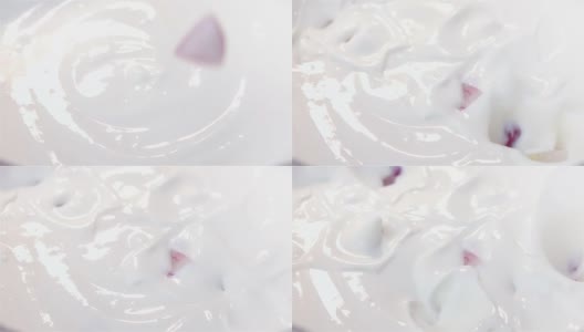 小萝卜掉进酸奶里的慢动作视频高清在线视频素材下载