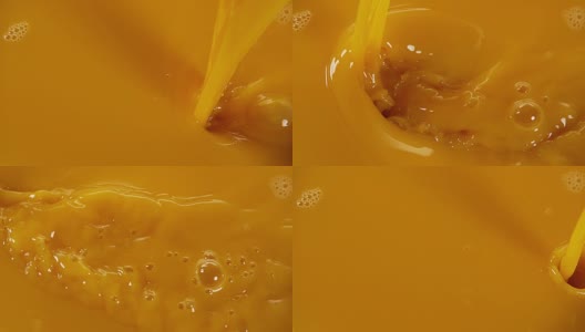 正在倒橙汁，4K慢镜头高清在线视频素材下载