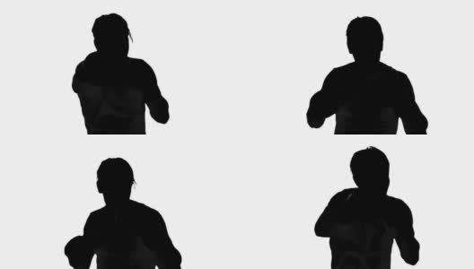 一个人的剪影拳击在白色的背景高清在线视频素材下载
