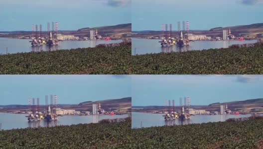 英国苏格兰尼格克罗马蒂湾港口的石油钻井平台高清在线视频素材下载