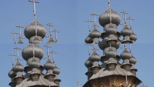美丽的教堂圆顶Vsekhsvyatsky Skete是一个著名的木制修道院，紧挨着Svyatogorsk Lavra。美丽的木制古建筑高清在线视频素材下载