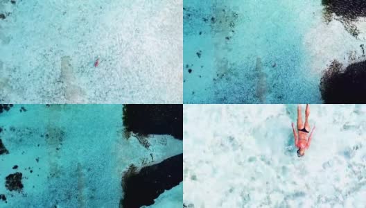 马尔代夫，女子在清澈的水中漂浮和浮潜高清在线视频素材下载