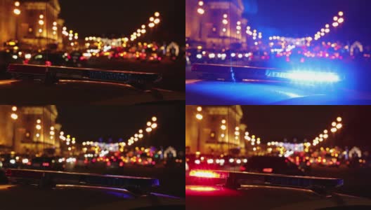 一辆交警车闪烁的灯光和夜间城市街道模糊(散焦)的背景。高清视频高清在线视频素材下载