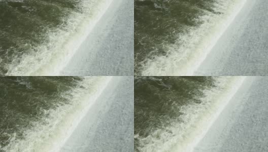从水电站大坝倾泻而下的水高清在线视频素材下载