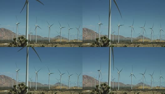 后面是一排排的风力涡轮机高清在线视频素材下载