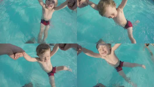 小男孩在游泳池里旋转高清在线视频素材下载