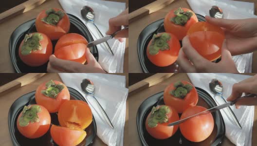 美味的熟柿子放在盘子里高清在线视频素材下载
