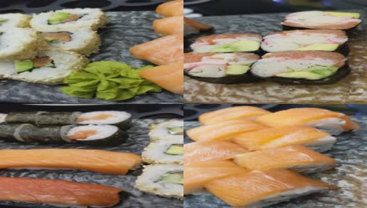 寿司卷。黑色盘子上的各种寿司高清在线视频素材下载