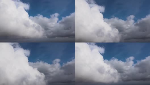 从飞机窗口高空俯瞰，在暴雨前形成的蓬松的积云覆盖着大地高清在线视频素材下载