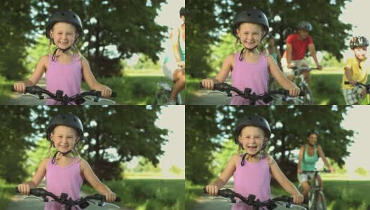 一个骑自行车的小女孩的肖像高清在线视频素材下载