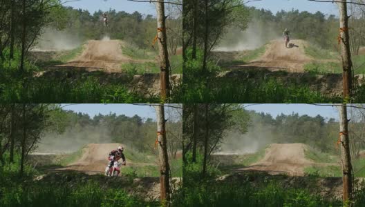 越野摩托车骑手在赛道上跳跃(4K/超高清)高清在线视频素材下载