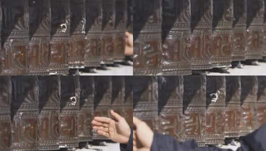 人的手转动，神圣的西藏祈祷轮高清在线视频素材下载