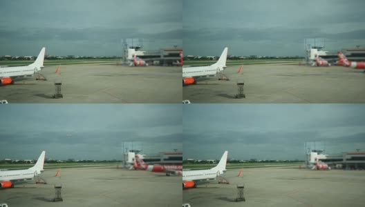 飞机停在大型机场高清在线视频素材下载