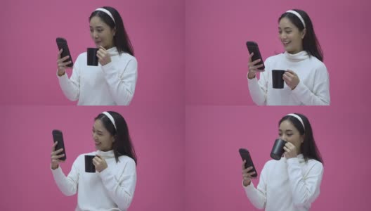 美丽的亚洲女性微笑着用智能手机网购和喝咖啡高清在线视频素材下载