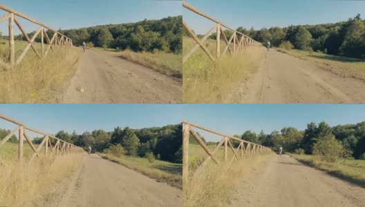 POV: Riding a bicycle in a beautiful summer day.高清在线视频素材下载