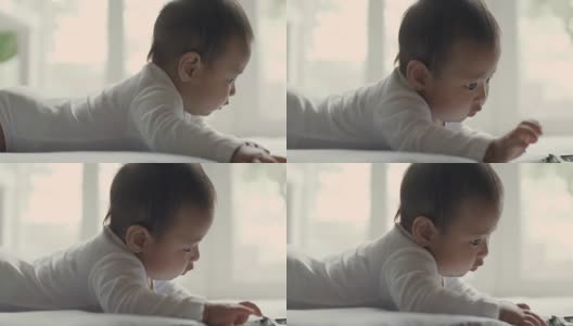 小婴儿在爬，特写高清在线视频素材下载